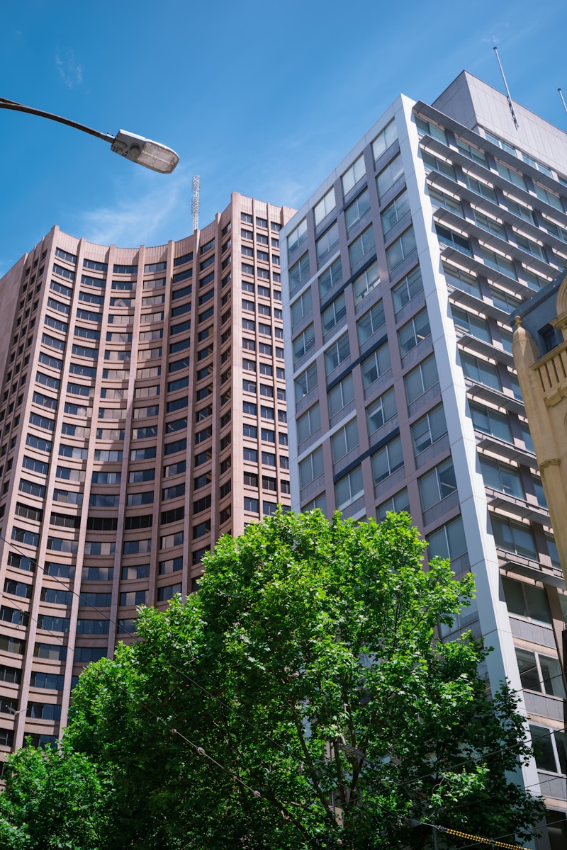 a street light in front of a tall building